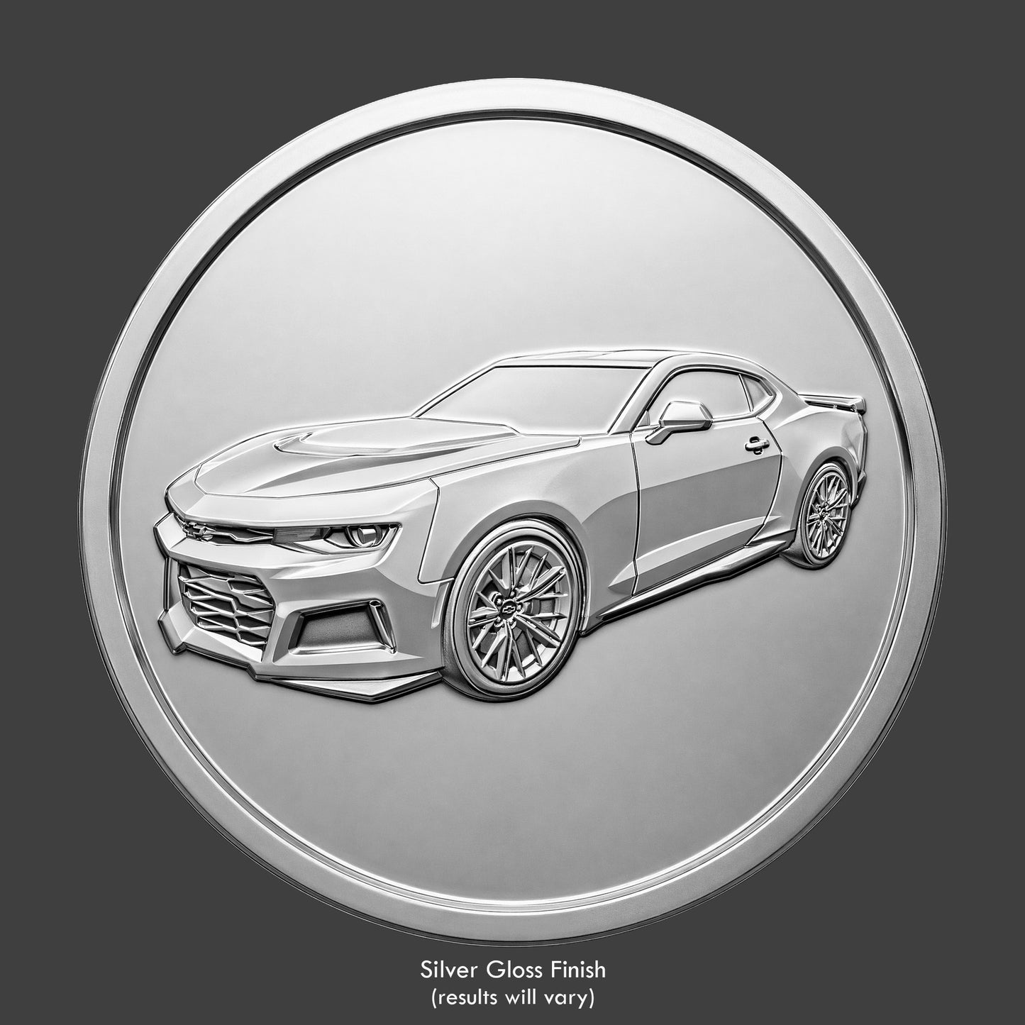 A silver finished, resin sculpted coin of a Chevy Camaro ZL1