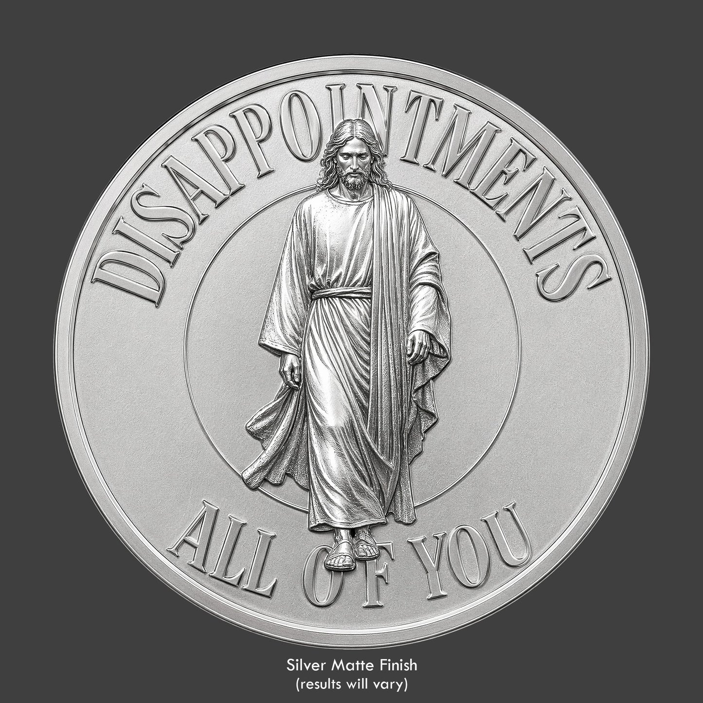 A silver finished, resin sculpted coin of a disappointed Jesus