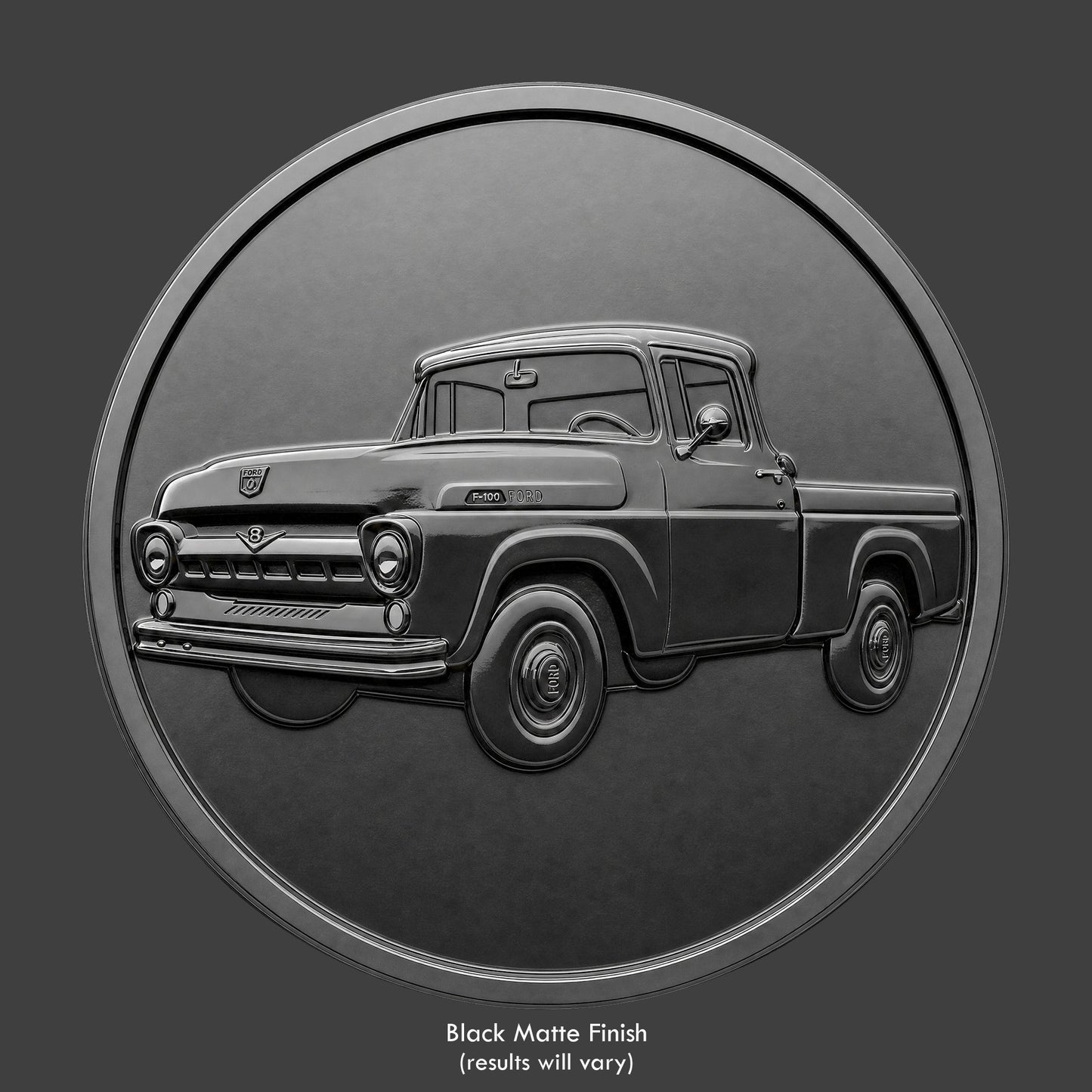 A black finished, resin sculpted coin of a 1957 Ford F100 pickup