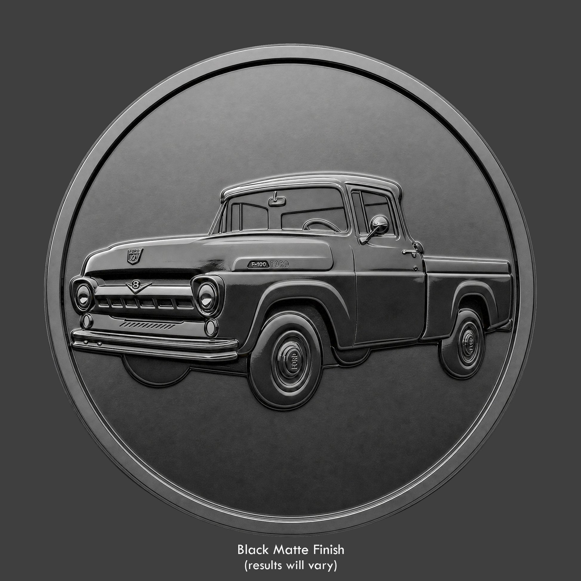 A black finished, resin sculpted coin of a 1957 Ford F100 pickup