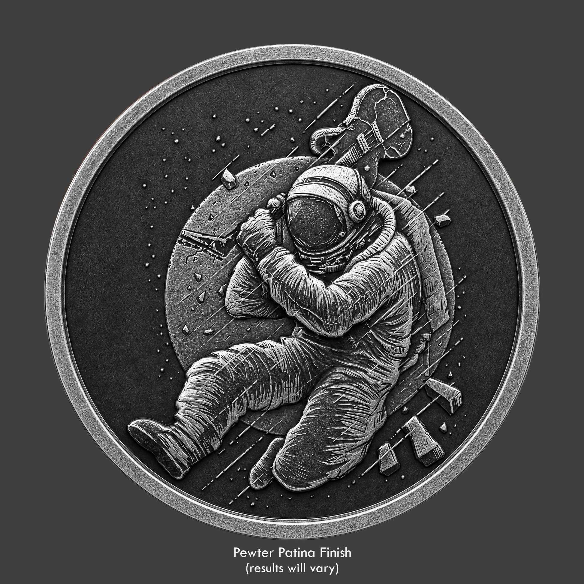 A pewter finished, resin sculpted coin of a astronaut rocker