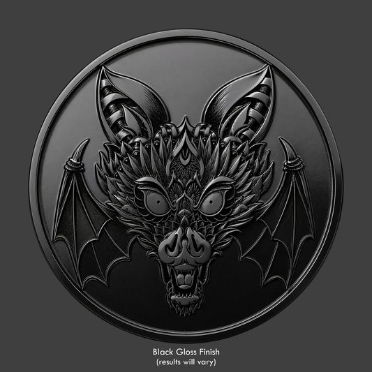 An ornate bat with intricate patterns on a coin