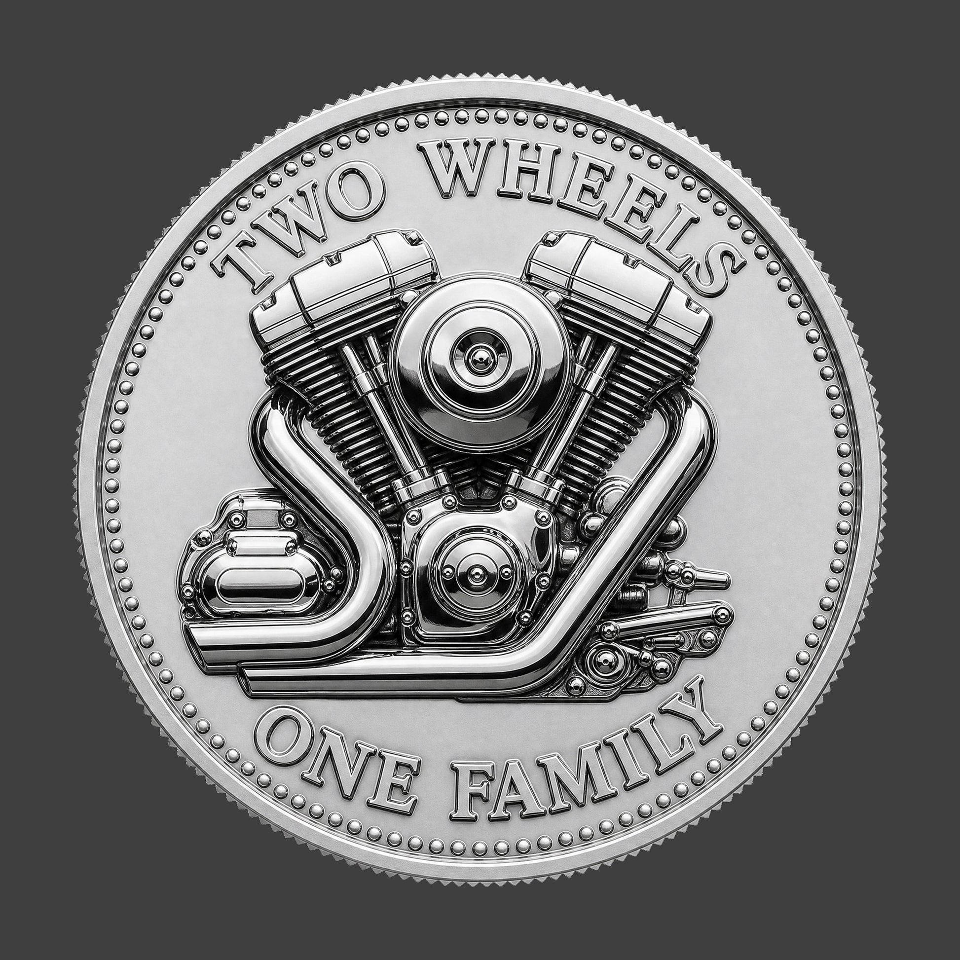 A V-Twin image and club motto on a silver coin