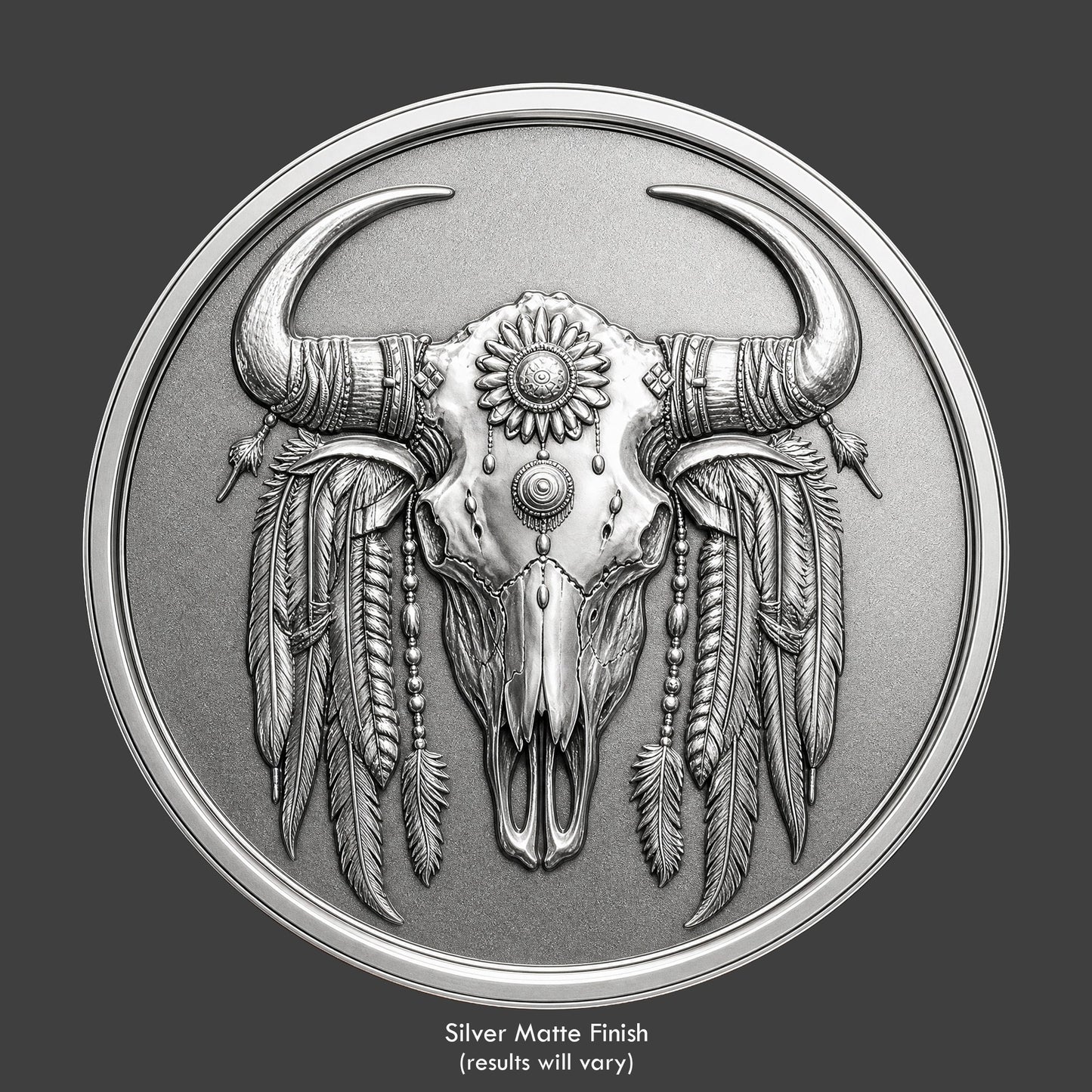 A pewter finished, resin sculpted coin of an indian buffalo skull