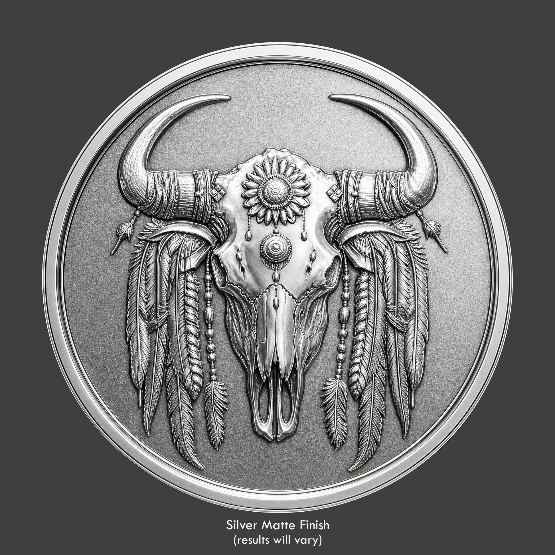 A pewter finished, resin sculpted coin of an indian buffalo skull