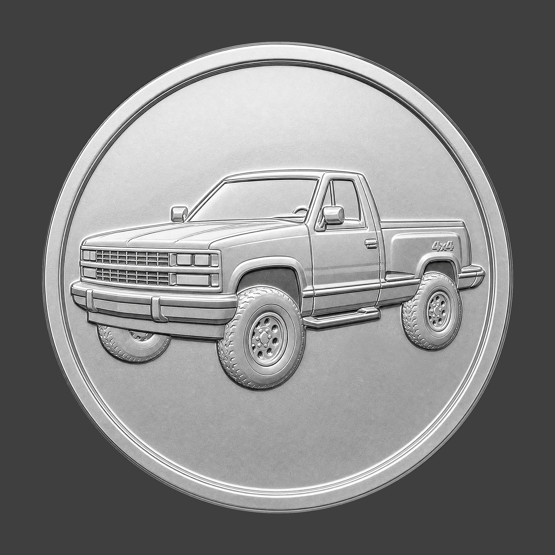 A silver finished, resin sculpted coin of a Chevy Pickup 4X4