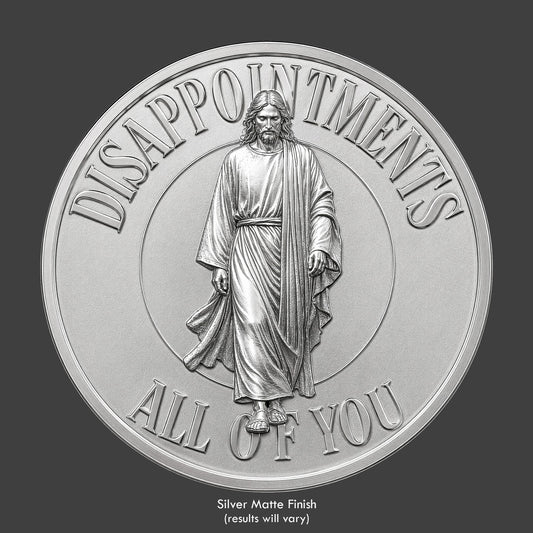 A silver finished, resin sculpted coin of a disappointed Jesus