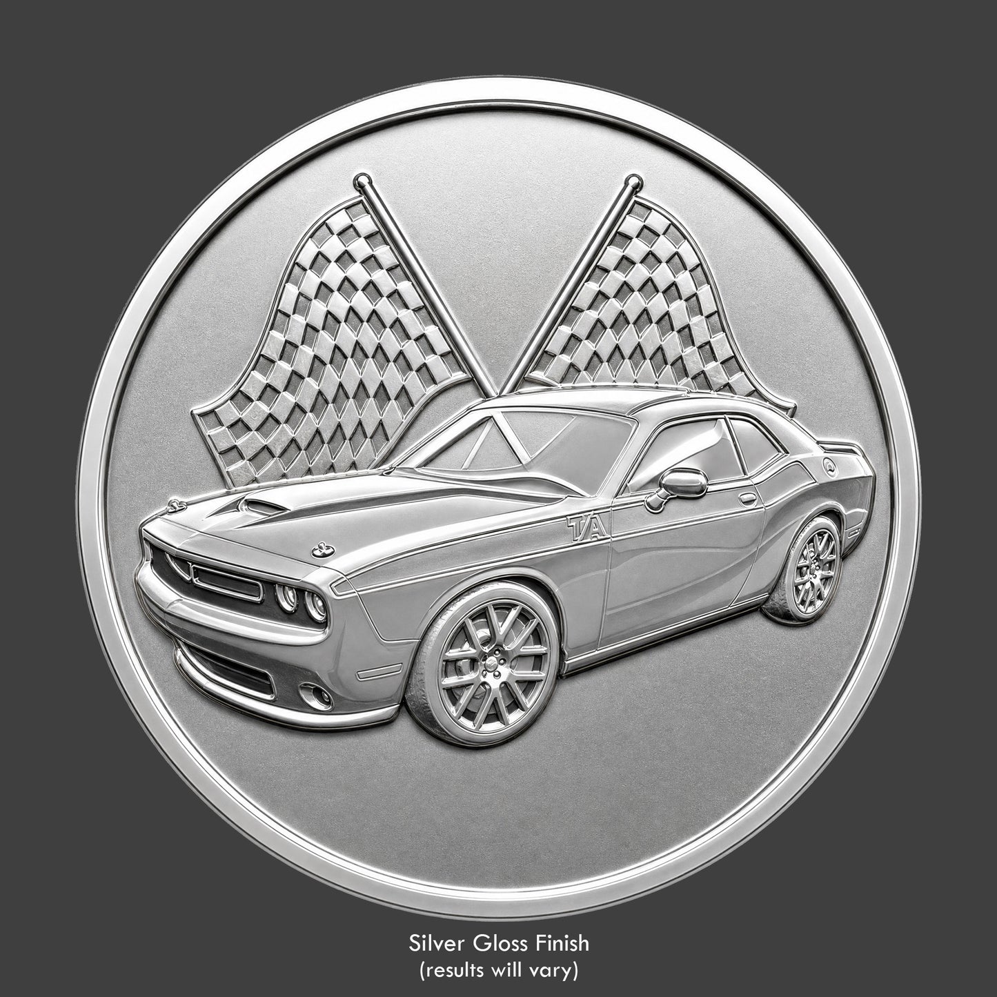 A silver finished, resin sculpted coin of a Dodge Challenger TA