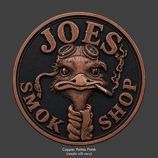 Joe's Smoke Shop logo on a copper patina coin