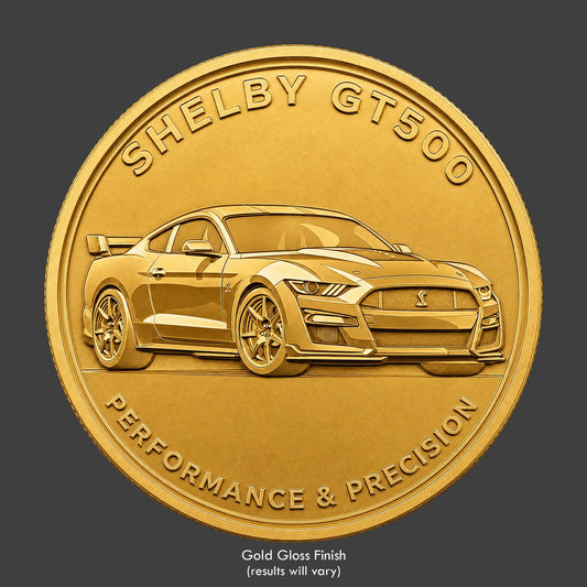 A gold finished, resin sculpted novelty coin of a Ford Shelby GT500
