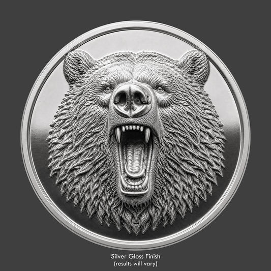 A silver finished, resin sculpted coin of a grizzly bear