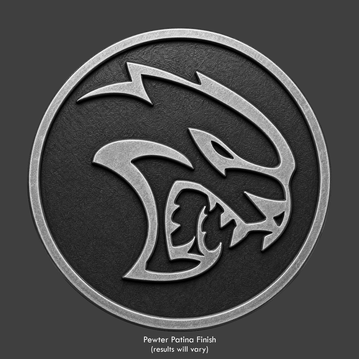 A pewter finished, resin sculpted coin of a Hellcat logo