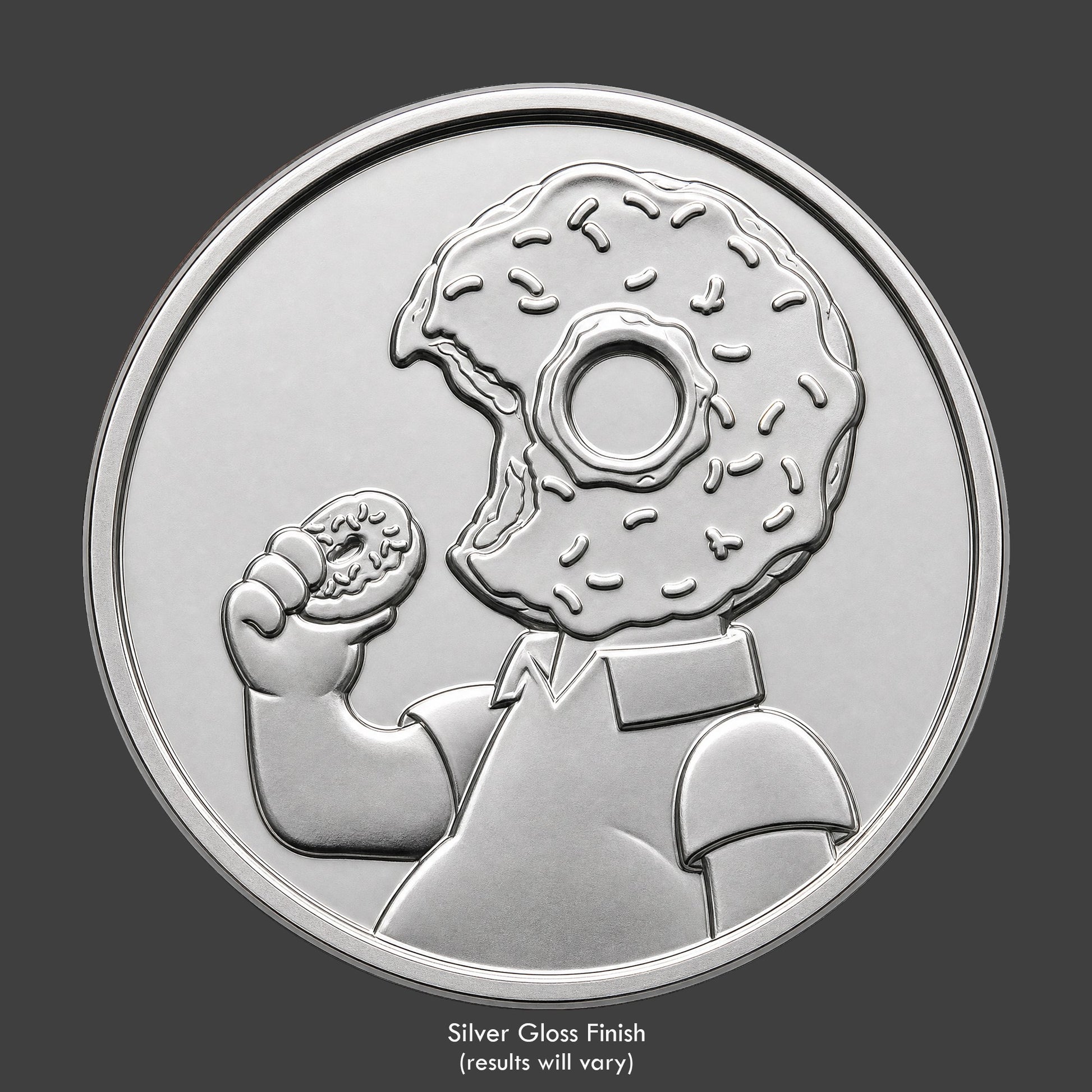 A silver finished, resin sculpted novelty coin of a Homer Simpson