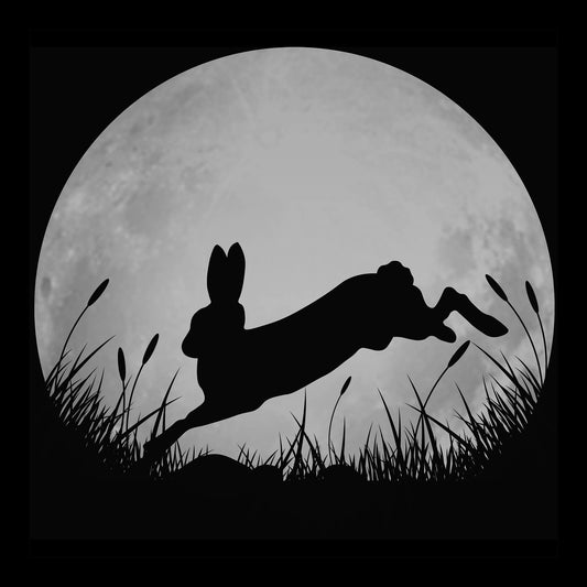 Silhouette of a jack rabbit leaping in front of a full moon