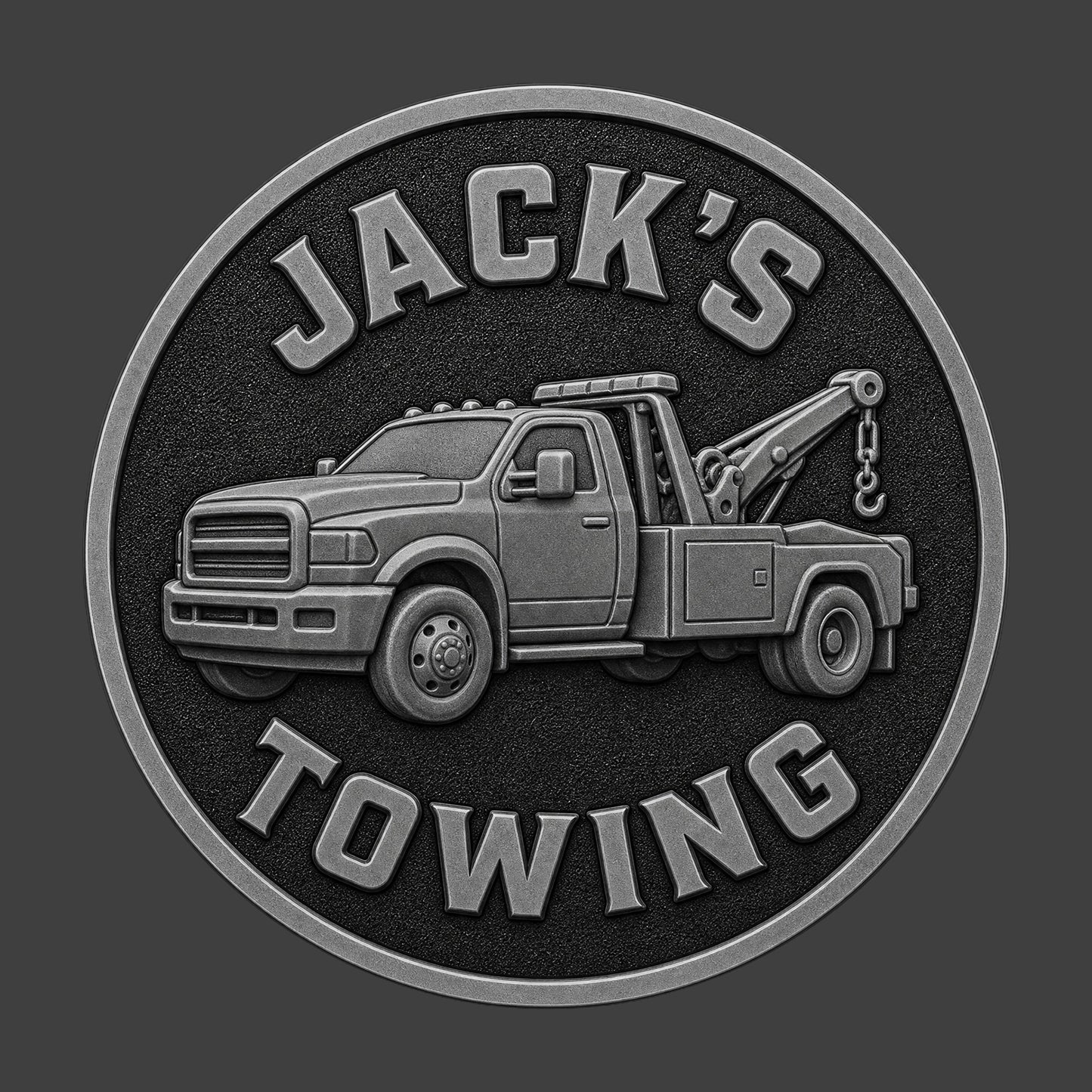 A sample company logo coin with a tow truck.