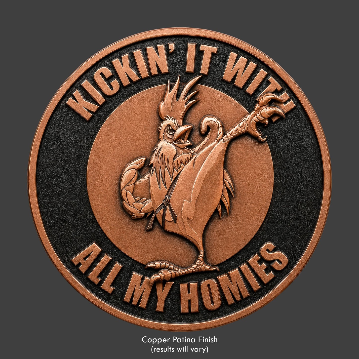 A copper finished, resin sculpted coin of a karate fighting rooster
