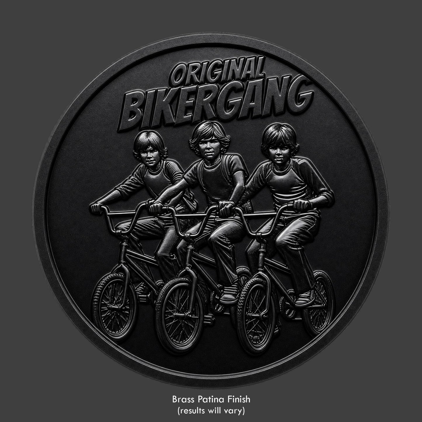 A black shiny coin of 3 kids on sting ray bikes