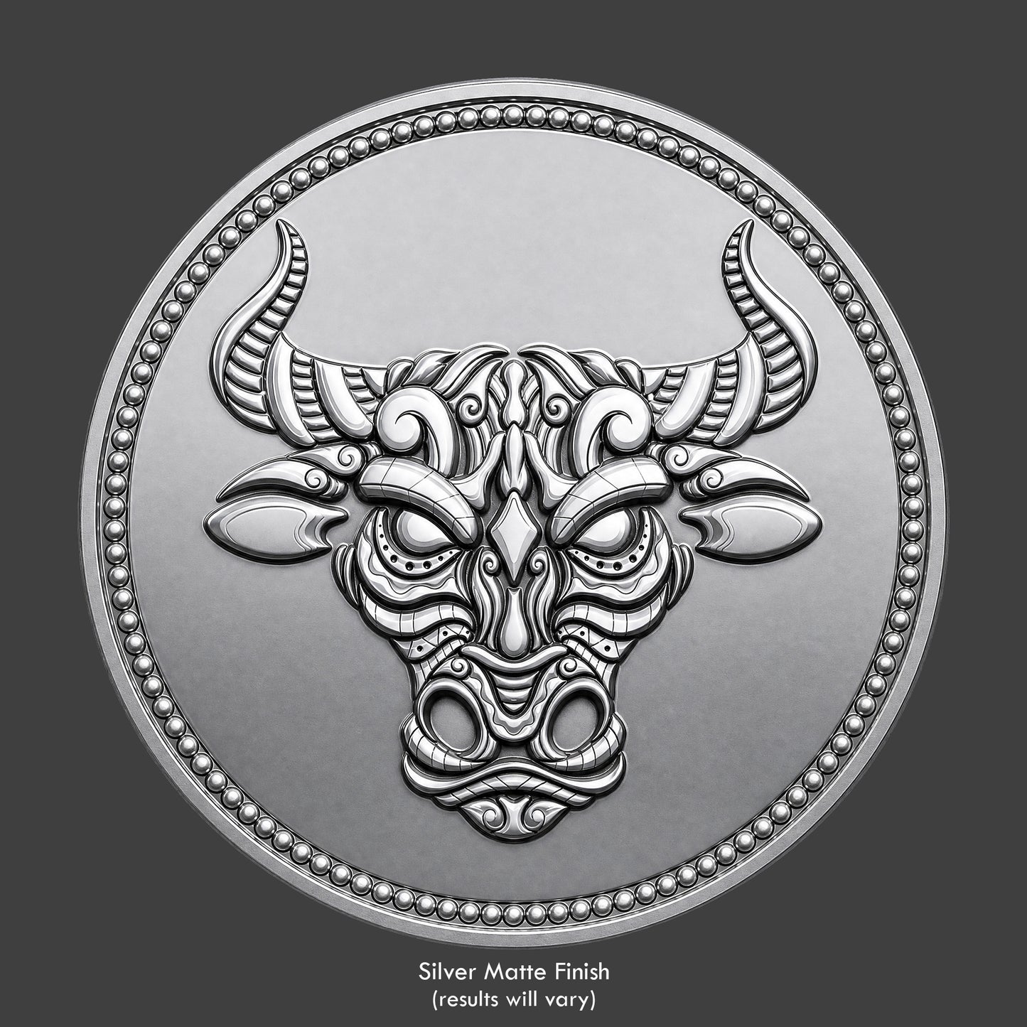 A silver finished, resin sculpted coin of a ornate bull