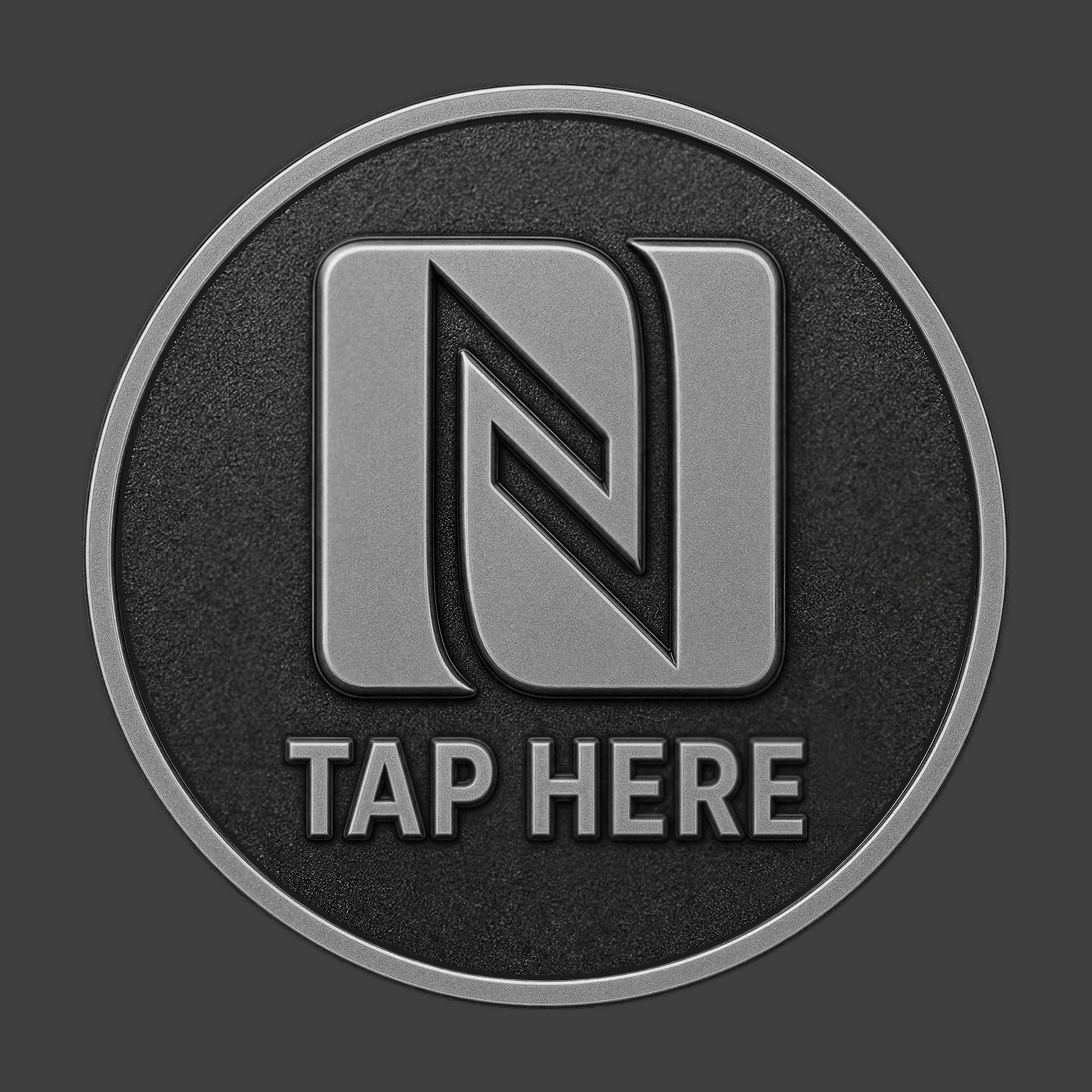 A pewter TapCoin with an NFC logo