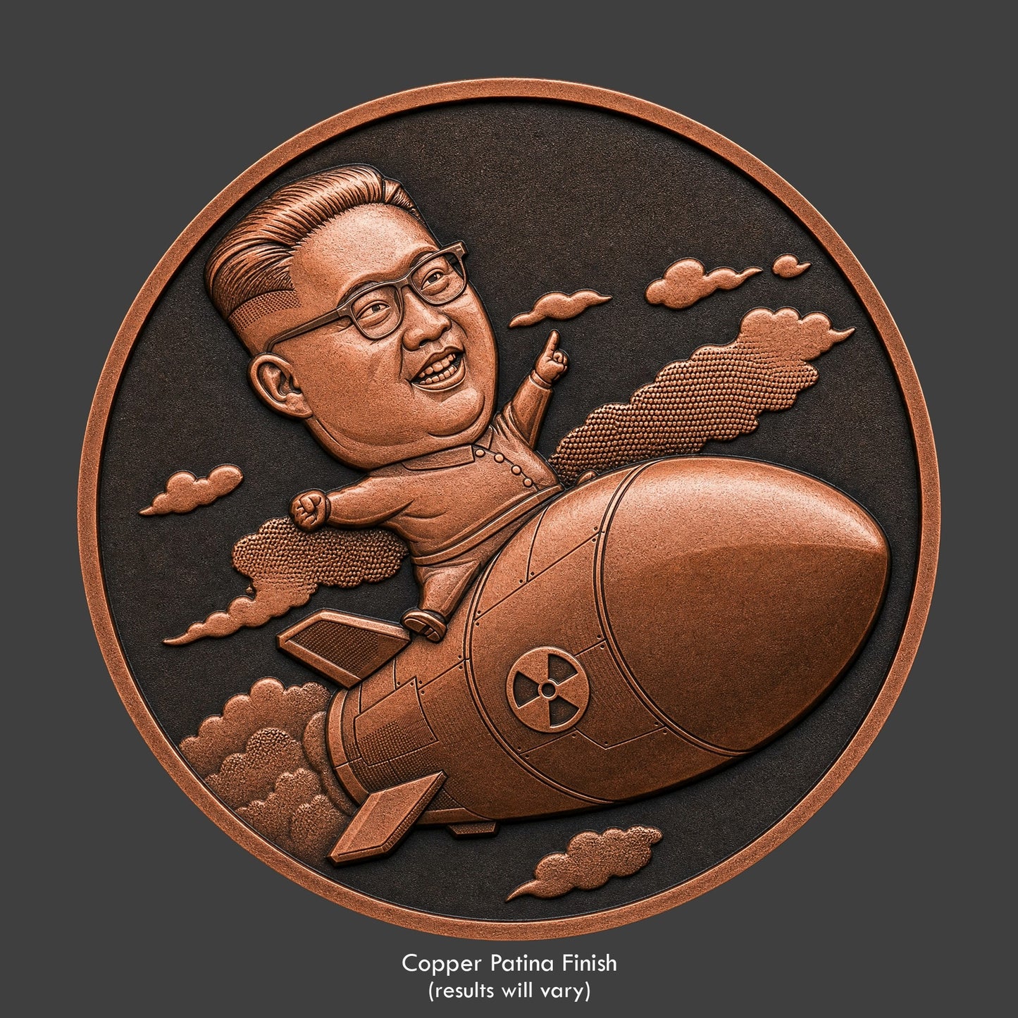 A copper finished, resin sculpted coin of a Kim Jung Un riding a missel