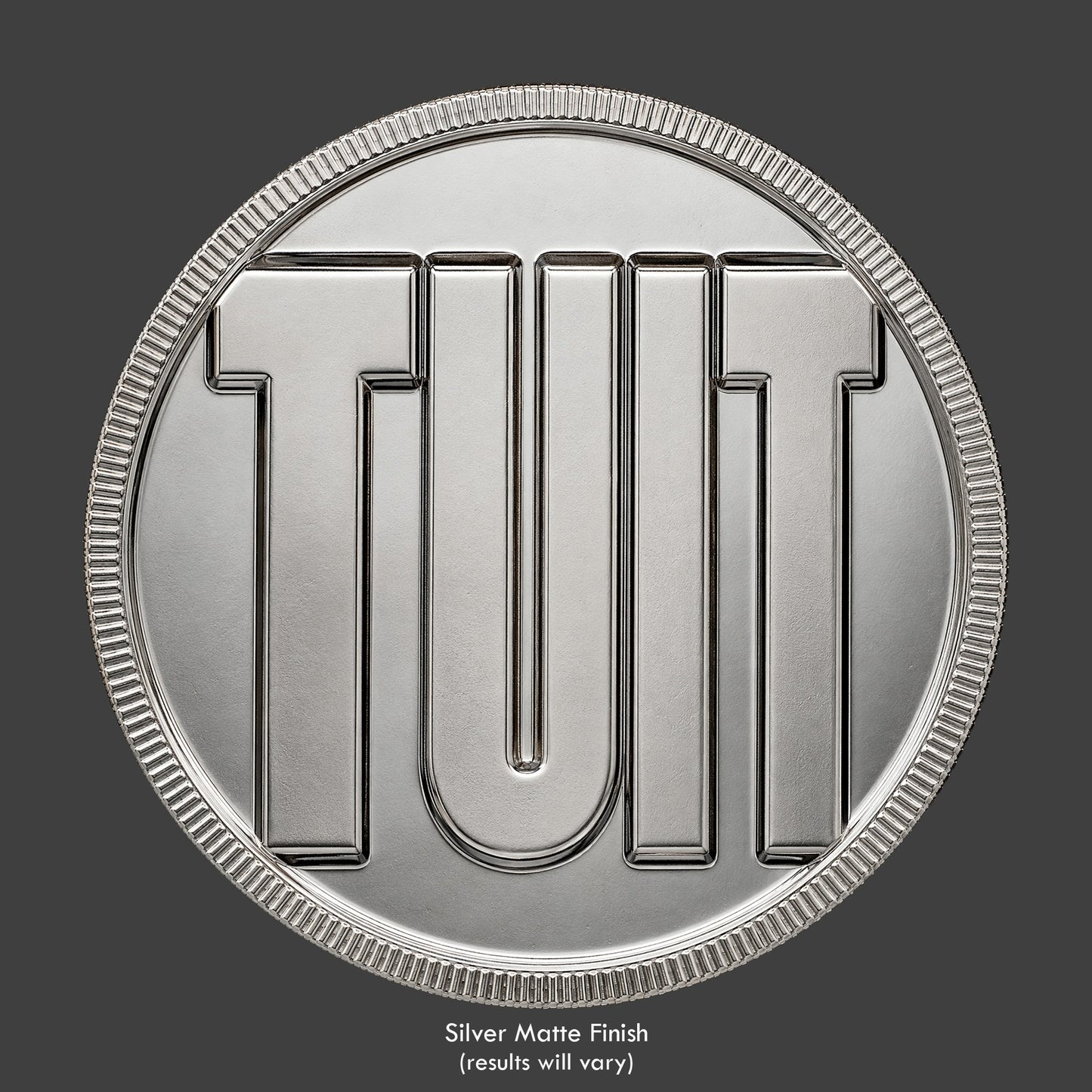 An Round TUIT novelty coin