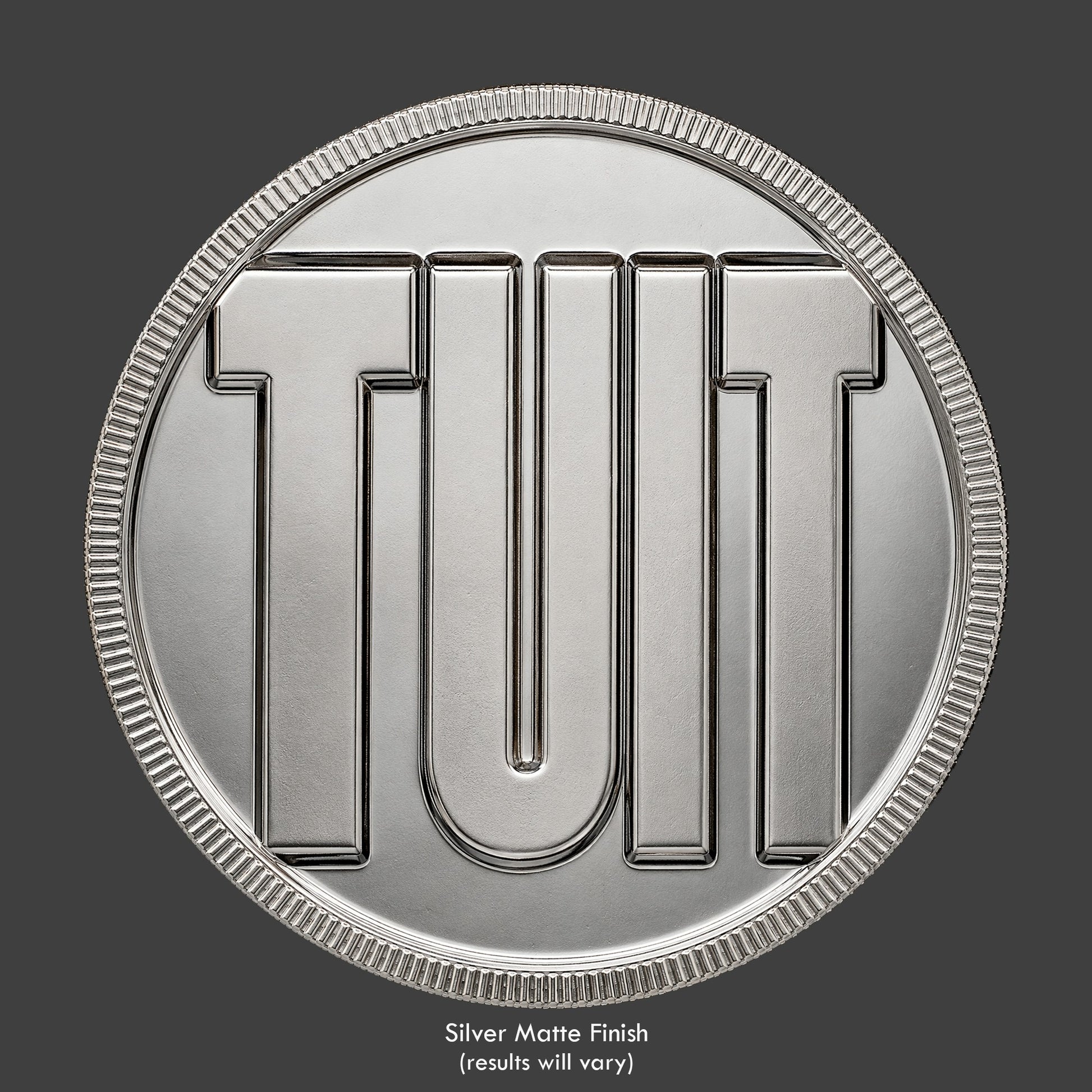 An Round TUIT novelty coin
