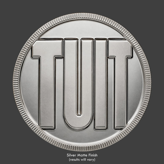 An Round TUIT novelty coin