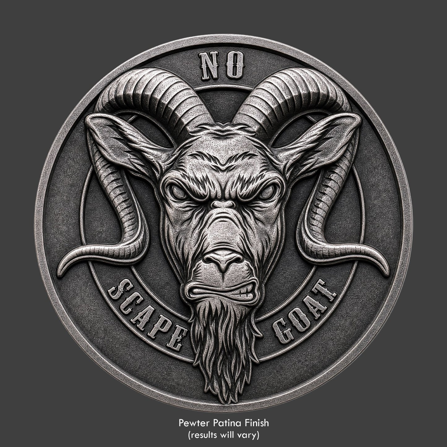 A pewter finished, resin sculpted coin of a goat