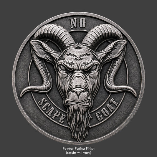 A pewter finished, resin sculpted coin of a goat