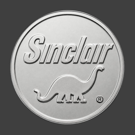 A silver finished, resin sculpted coin of a Sinclair logo