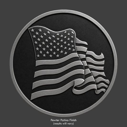 An American waving flag on a pewter patina coin