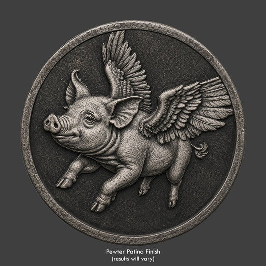 A pewter finished novelty coin of a flying pig